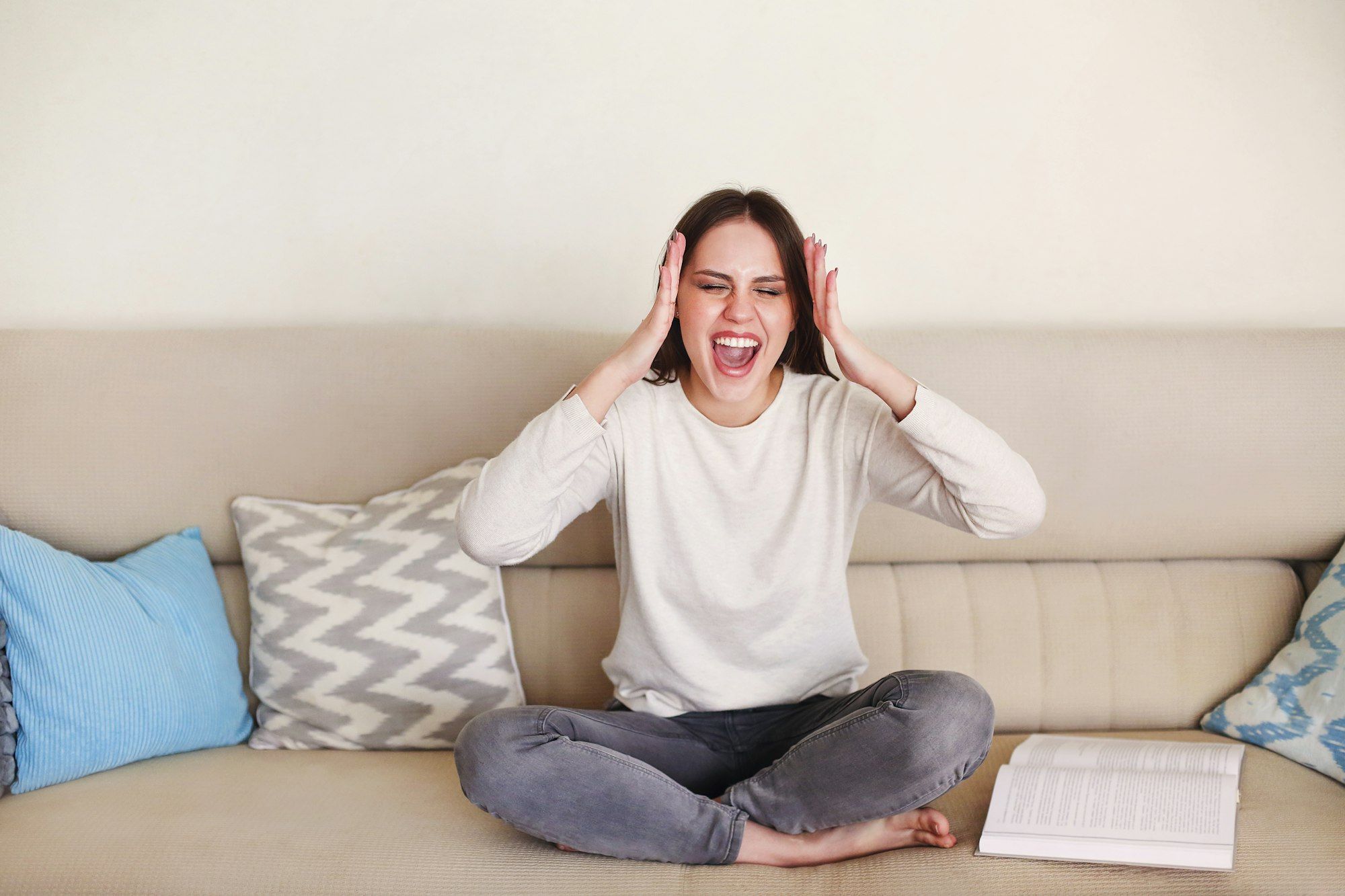 Stressed woman working remotely at home